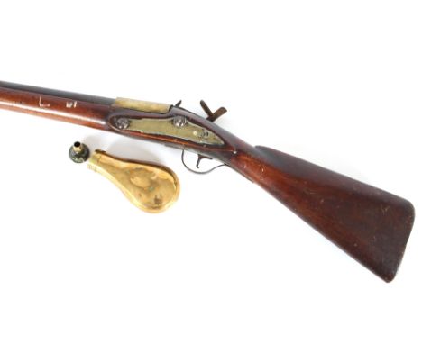 An Antique flintlock fowling piece, with integral ramrod, 197cm long overall; together with a copper and brass banded powder 