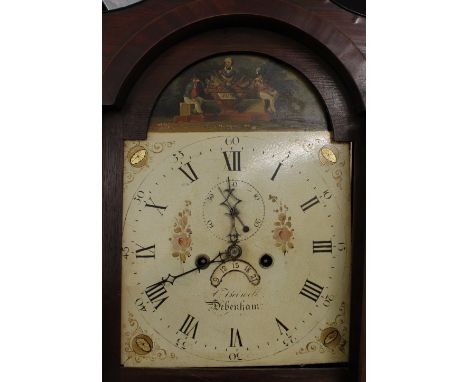 An early 19th Century oak and mahogany cross-banded long case clock, having arched hood surmounted by turned finials, the pai