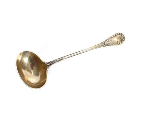 A Victorian silver sauce ladle, with foliate embossed decoration, makers mark GA, London 1872