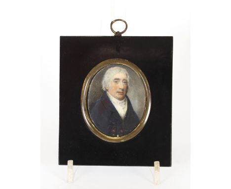 A 19th Century miniature portrait of a gentleman on ivory, contained in a period papier mache frame