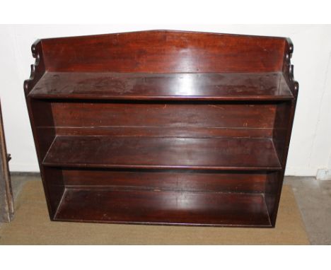 A George III mahogany hanging wall shelf, 88cm wide x 69cm high