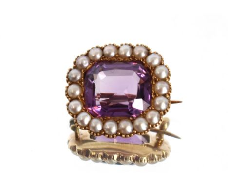 A yellow metal pearl and amethyst set brooch