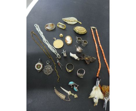 A collection of vintage jewellery including mourning brooch, tested as 14 or 15ct gold, seed pearl and 9ct gold clasp, 9ct go