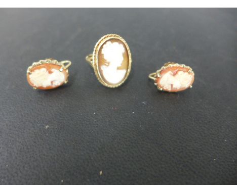 A 9ct yellow gold cameo ring size J/K and a pair of screw back 9ct gold cameo earrings