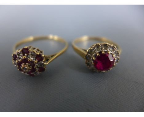 A 9ct yellow gold ruby and diamond cluster ring - size S and a 9ct yellow gold ruby and diamond ring, the central ruby surrou