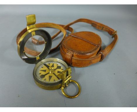 A leather cased brass compass by Elliot Bros London 1903 No 1353 - in good condition