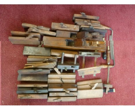 A quantity of woodworking tools, mostly planes, some saws and other instruments - varying condition