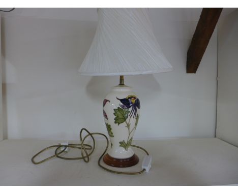 A Moorcroft lamp, decorated with Columbine pattern together with shade and base - Height 26cm excluding fittings - PAT tested