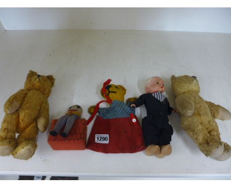 A collection of toys including a doll, two teddy bears, hand puppet and Humpty Dumpty