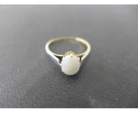 A 9ct yellow gold opal ring size L - approx weight 1.5 grams