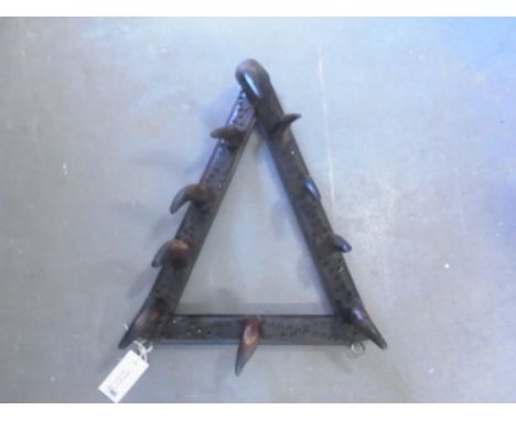 An early 20th century cow horn coat rack - 64cm x 47cm