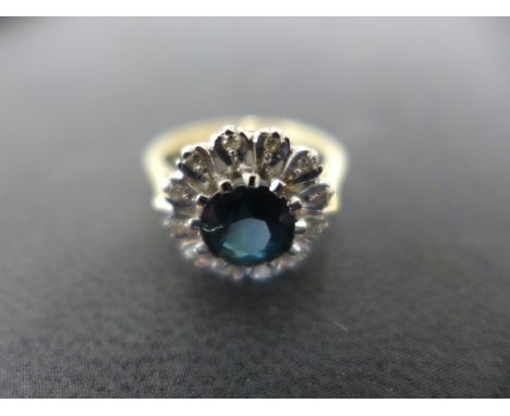 An 18ct yellow gold diamond cluster ring size K/L - weight approx 4.5 grams - minor usage marks, clean condition