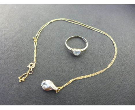 A 9ct yellow gold aquamarine and diamond pendant and a 9ct gold aquamarine ring with heart shaped aquamarine - ring size K - 