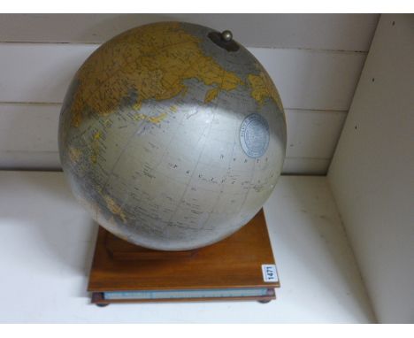 A globe, 1936, produced to celebrate Silver Jubilee of the Globe Indemnity Company New York. complete with wooden stand incor