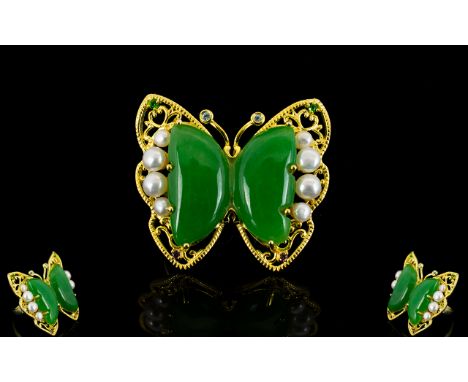 Green Jade and White Cultured Pearl Butterfly Statement Ring, an openwork butterfly set with two pieces of green jade to the 