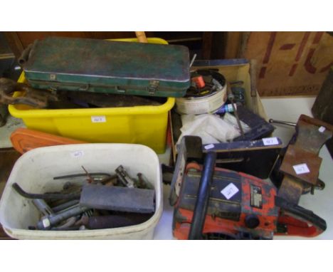 A quantity of tools: cased socket set, files, saws, bench vice, together with a Stihl petrol chainsaw. 