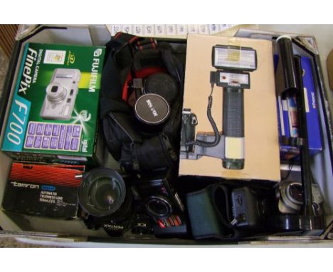A collection of vintage cameras: to include Zenit EM, Pentax ASAHI, Fugi digital cameras x 2 and a NISISIN electronic flash e