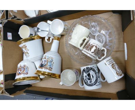 A mixed collection of items to include: Commemorative Wade Bells Whiskey Decanters together with similar mugs &amp; glassware