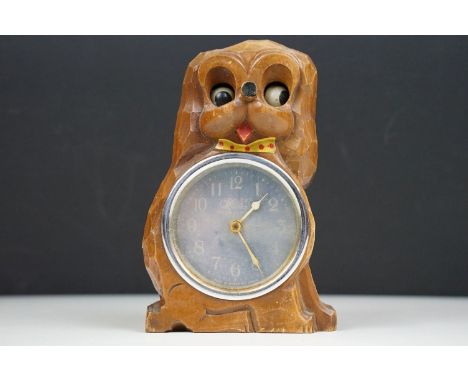 Vintage 1950's Poppo, Tezuka clock Co, Japanese moving eyes dog novelty desk clock, carved wood with mechanical wind up movem
