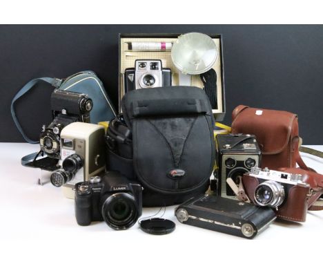 Quantity of cameras to include Panasonic Lumix DMC - fZ8 digital camera, boxed Kodak Brownie, a Box Brownie and 8mm cinecamer