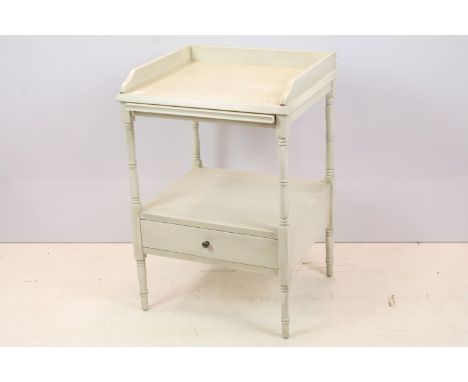 20th century bedside table, with galleried top above slide with shelf and drawer below with turned legs, 73cm high x 50cm wid
