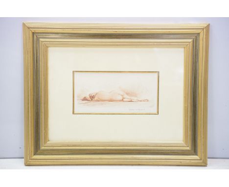 Auguste Jean Vyboud (1872 - 1944), reclining female nude, sanguine etching, signed in pencil lower right, 10 x 24cm, gilt fra