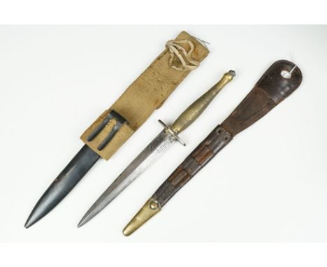 A Fairbairn Sykes commando fighting knife, blade marked Wilkinson Sword London to one side and The F.S Fighting Knife to the 