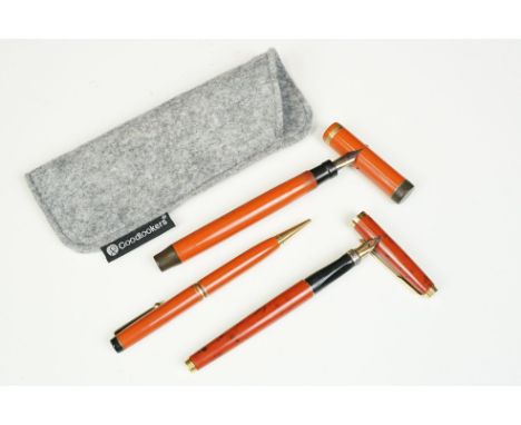 Parker Duofold Special orange 'Lucky Curve' fountain pen, signed A W R Parker, the nib marked Canada B, with a matching prope