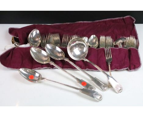 An extensive silver plated canteen of fiddle, thread and shell cutlery, comprising: pair of basting spoons, soup ladle, 12 so