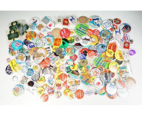 A collection of vintage button badges to include many advertising examples. 