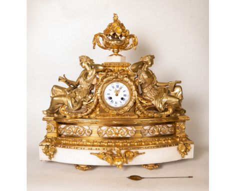 Clock measures: 58 x 58 x 18 cm. Chandelier measurements: 69 x 39 x 32 cm