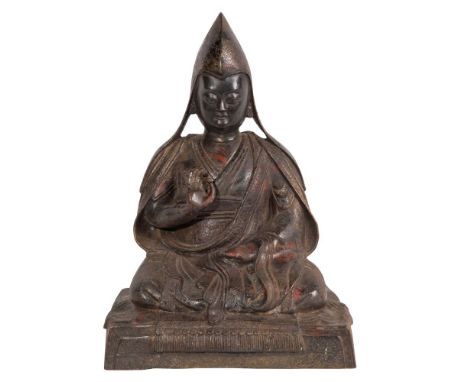 Tibetan Je Tsongkhapa Bronze Statue  Depicting the influential Buddhist monk / philosopher seated cross-legged on a low platf