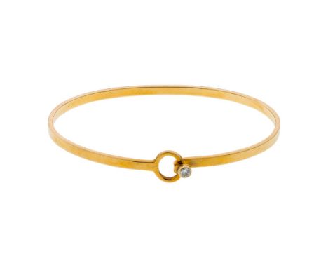 Tiffany &amp; Co 14k Yellow Gold and Diamond Bangle Bracelet  An eye hook catch bangle bracelet having a round cut diamond, i