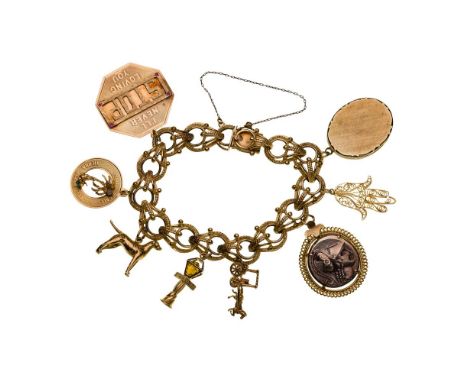 14k and 10k Yellow Gold Charm Bracelet  An O-link bracelet having eight attached charms (most marked '14k' / '10k', coin unma