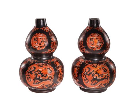 Chinese Double Gourd Porcelain Vases  Pair, black ground with orange dragon and floral motif, both having a red enamel Jiaqin