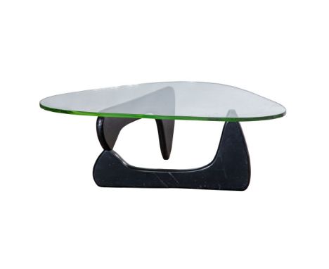 After Isamu Noguchi Coffee Table  Having a painted black swivel base and shaped plate glass top  Property from: a Private Col