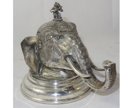 A Late Victorian Electroplated Britannia-Metal Inkwell, by Mappin & Webb:
 circa 1880, modelled as an elephant's head, the hi