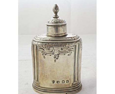 George II silver Tea Caddy
London 1756 of oval form with bright cut floral engraving and embossed columns to the quarters, sl