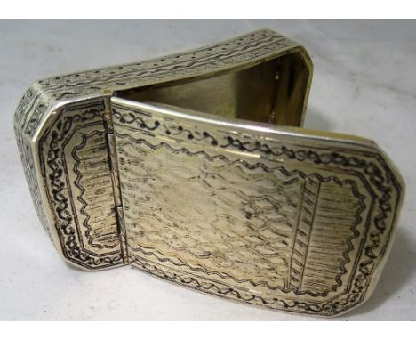 A Late 18th Century Italian Silver Pocket Snuff Box: of curved rectangular form with canted corners, decorated overall with w