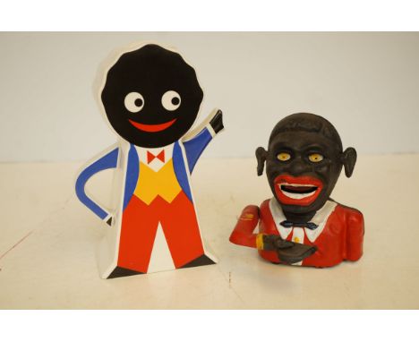 A ceramic teapot by Jenny and Geoff Morten together with a cast iron money bank
