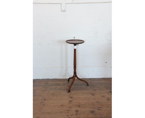 A William and Mary period candle stand, circa 1700, with turned circular tray top, turned octagonal tapering stem, tripod scr