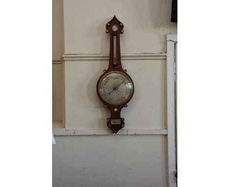 A mid 19th century rosewood case banjo barometer, thermometer, hygrometer with mother of pearl inlay and makers name P Bregaz