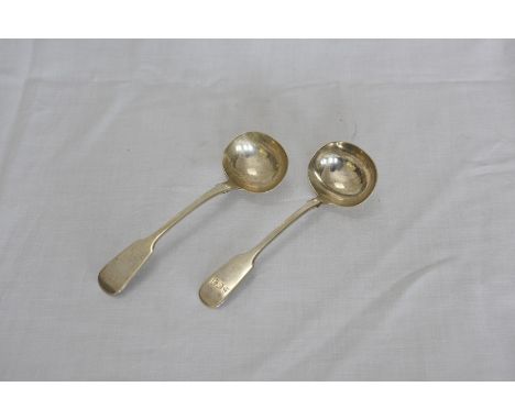 A Victorian silver ladle, the handle initialled ‘SCB’. London 1859.  Makers The Portland Co.  (Francis Higgins III) and a Vic