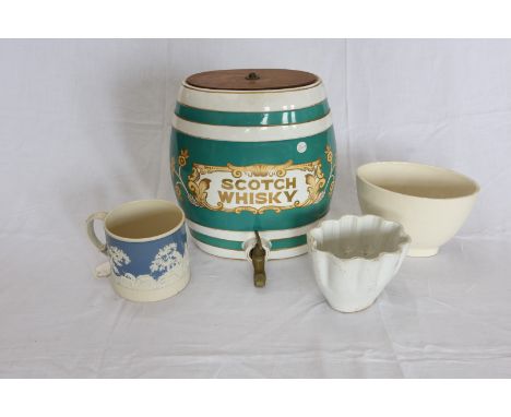 A Scotch Whisky barrel, now converted to a lamp.  A brawn mould.  A jelly mould and a large Cream Ware mug with overlaid deco