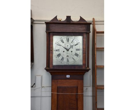 An 18th century oak cased longcase clock with reeded pilasters to the hood, the silvered dial with Roman numerals, subsidiary
