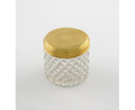 A George III 18 carat gold-mounted toilet jar, maker's mark worn, London 1816, circular form, hob-nail cut decoration, the pu