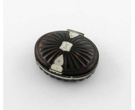 λAn early 18th century silver-mounted tortoiseshell snuff/tobacco box, unmarked, circa 1700-1720, oval form, fluted decoratio