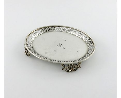 A Victorian silver waiter / tea pot stand, by Edward Farrell, London 1838, oval form, pierced scroll gallery, on four pierced