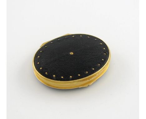 λA George I gold-mounted snuff box, unmarked, circa 1720, oval form, the cover and base of leather inset with gold stud work,