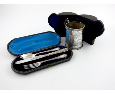 A Victorian silver mug, by Barnard & Sons Ltd, London 1857, circular form, with a scroll handle, engine turned and bright-cut